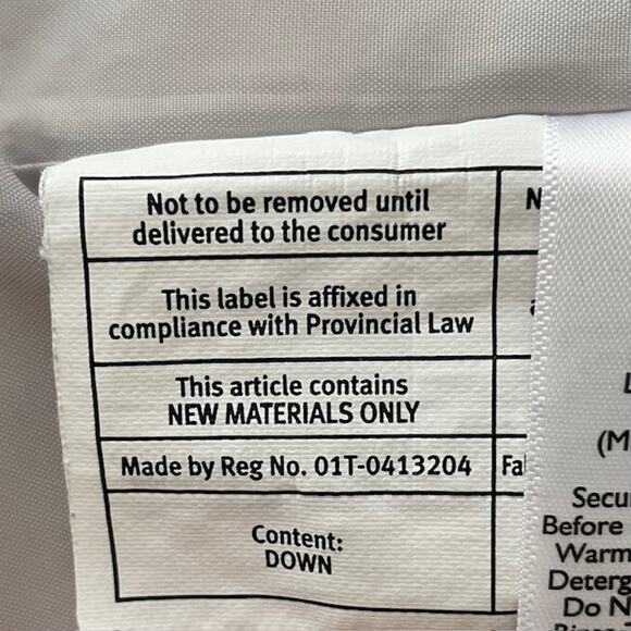 Eddie Bauer EB650 down women's vest in white with side pockets. - Picture 12 of 12